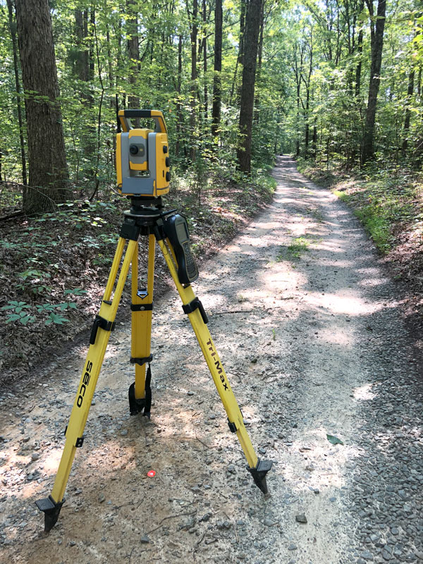Survey equipment in the woods